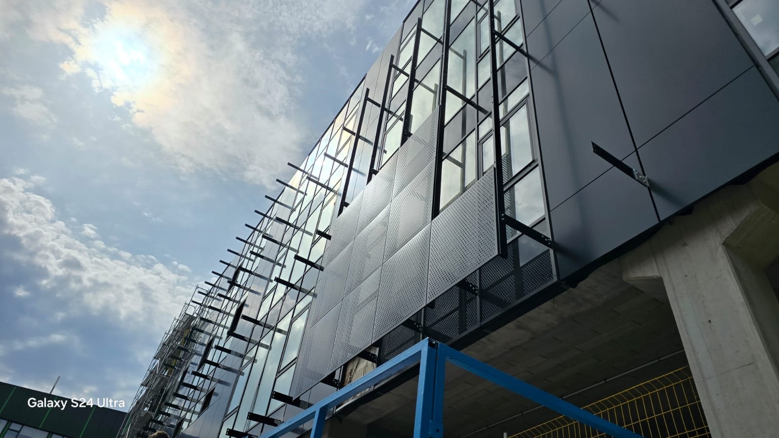 Facade panels and metal interfaces